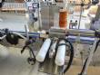 Etiquetadora autom�tica para botellas y tarros cil�ndricos planos Maqmundi