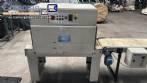 Selladora autom�tica en L con t�nel de retracci�n.