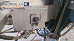 Etiquetadora automtica de doble cabezal para botellas planas Bauch Campos