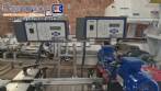 Etiquetadora automtica de doble cabezal para botellas planas Bauch Campos