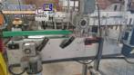 Etiquetadora automtica de doble cabezal para botellas planas Bauch Campos