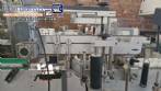 Etiquetadora autom�tica de doble cabezal para botellas planas Bauch Campos