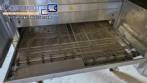 Horno transportador Lincoln de acero inoxidable para hornear galletas y pizza.