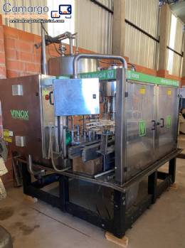 Llenadora rotativa gravim�trica de acero inoxidable con cabina