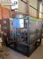 Llenadora rotativa gravimtrica de acero inoxidable con cabina