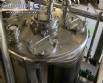 Llenadora rotativa gravim�trica de acero inoxidable con cabina