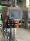 Llenadora rotativa gravim�trica de acero inoxidable con cabina