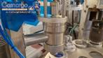 M�quina rotativa de acero inoxidable para llenado, dosificaci�n y sellado, con junta de aluminio, para tarros, vasos y botellas Delgo.