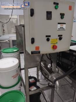 Dosificadora Peres & Cannheiro de 120 kg con mezclador de palas de acero inoxidable para productos pastosos granulados
