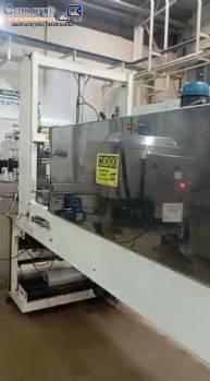 Mquina etiquetadora con tnel de vapor para mangas y prensa de botellas