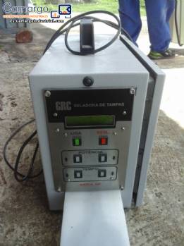 Sellador por inducci�n para tapas GRC